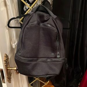 NWOT lululemon black mesh backpack. Worn twice, like new condition